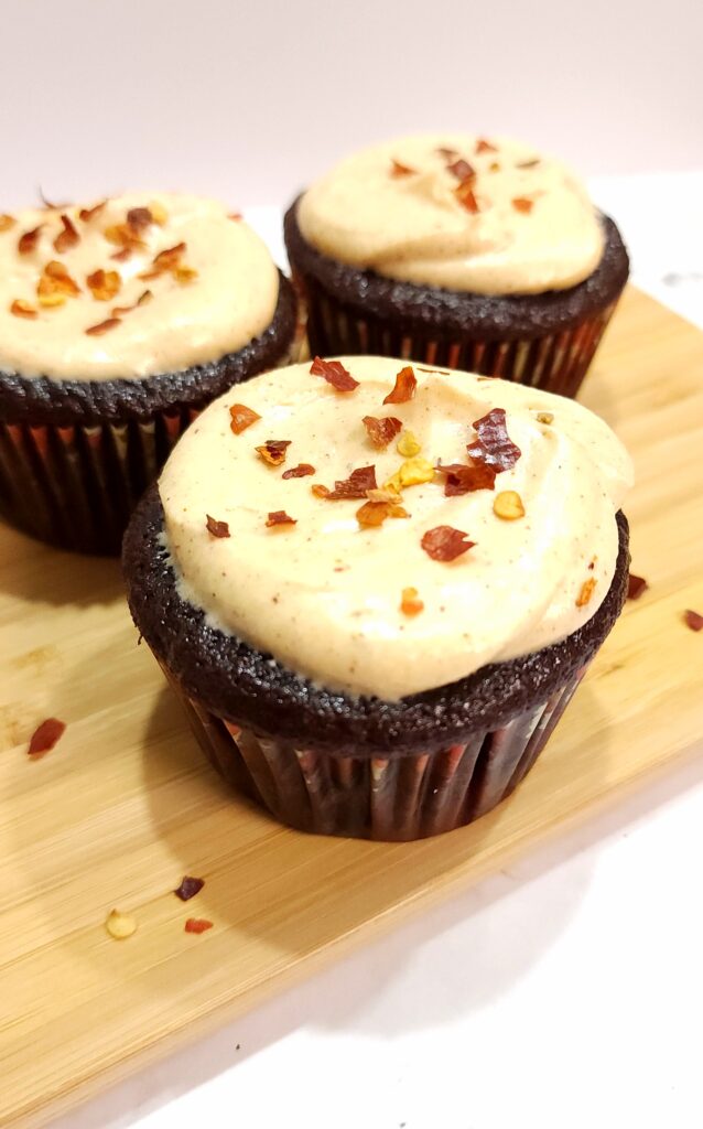 Chocolate Cupcakes with chili powder and red pepper sprinkles