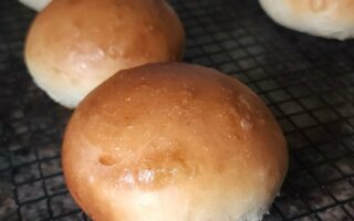 homemade hamburger bun on cooling rack